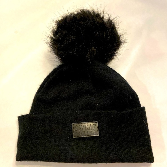 Sweat Active Accessories - Black winter hat with Pompom, purchased from CycleBar